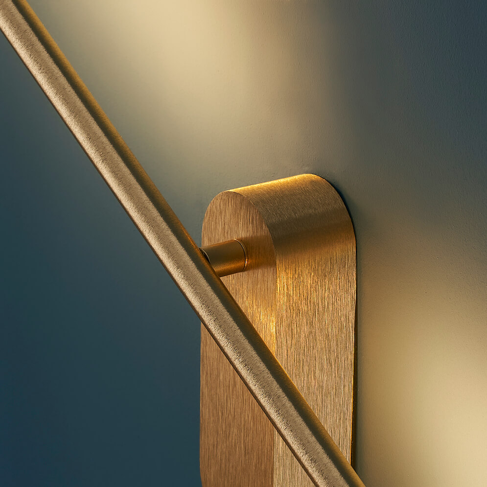 Long golden pivoting wall lamp Melbourne